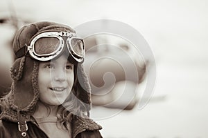Young female pilot looking into distance
