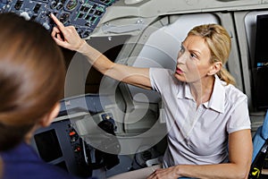 Young female pilot ready for takeoff