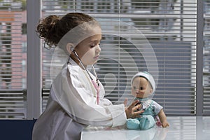 Young female playing doctor