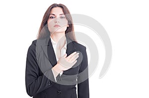 Young female politician or lawyer making an oath