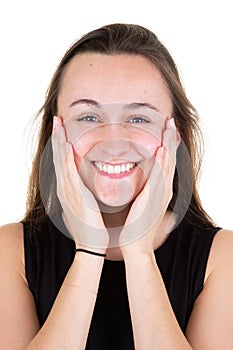 Young female portrait beautiful face with hands on face in white background