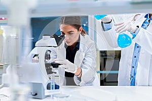 Young female researchers conducting laboratory test