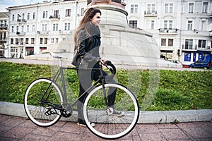 Young female riding a bicycle
