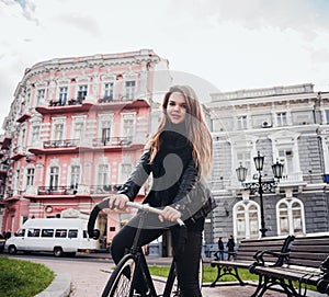 Young female riding a bicycle