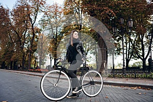 Young female riding a bicycle