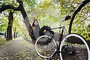 Young female riding a bicycle