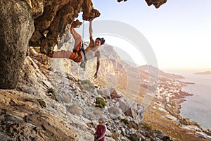 Young female rock climber