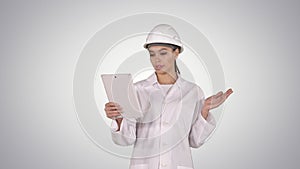 Young Female Scientist Making Video Call With Tablet on gradient background.