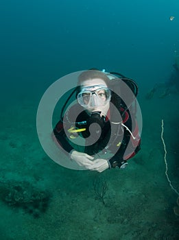 Young female scuba diver portrait