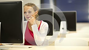 Young female student in a computer classroom