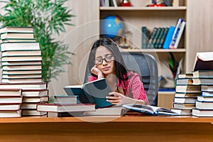 The young female student preparing for college school exams