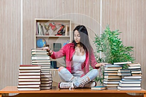 The young female student preparing for college school exams