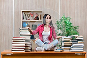 The young female student preparing for college school exams