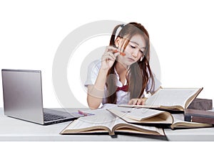 Young female student studying