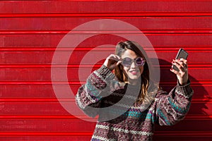 Young female teen taking a selfie