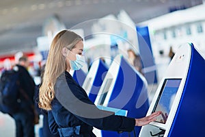 Young female traveler in international airport