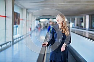 Young female traveler in international airport