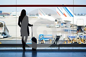 Young female traveler in international airport