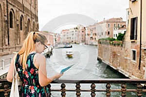 Young female traveler sightseeing in Venice - Italy