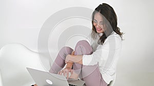 Young female using laptop