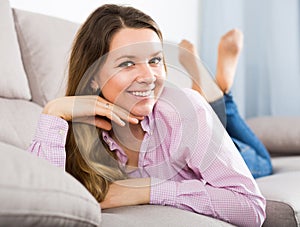 Young female is using various poses having good time