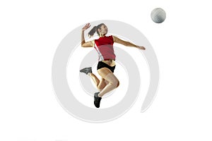 Young female volleyball player isolated on white studio background in flight and motion