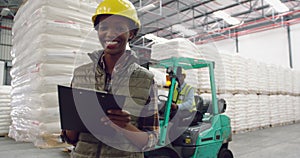 Young female worker in a warehouse