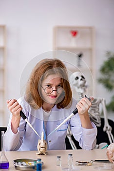 Young female zoologist working at the lab