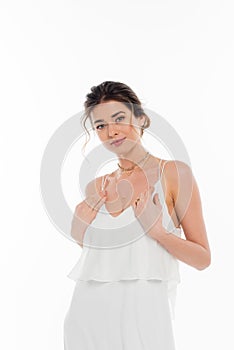 young fiancee in elegant dress looking