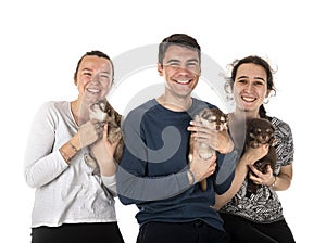 Young Finnish Lapphund and owners