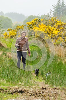 Young fisher-woman with a rode