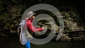 Young Fisherman catching on a river.