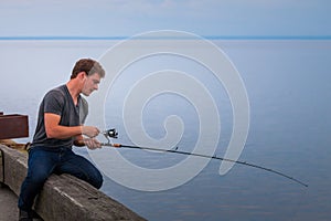 Young Fisherman Fishing Mackerel