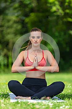 Female Young Fit Healthy Woman or Girl Practicing Yoga Outside