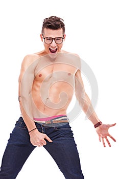 Young fit shirtless man wearing glasses