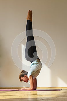 Young fit woman doing stretching exercise