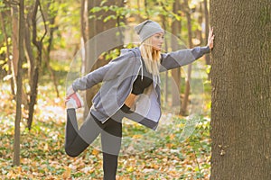 Young and fit woman stretching her muscles. Healthy and sport concept