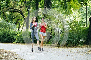 Young fit women jogging outdoors