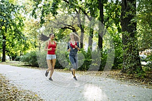 Young fit women jogging outdoors