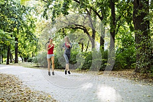 Young fit women jogging outdoors