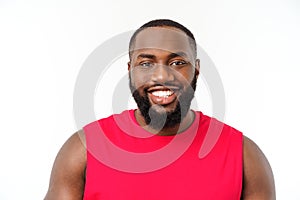 Young fitness african black man in sport wear cheering carefree isolated over white background.