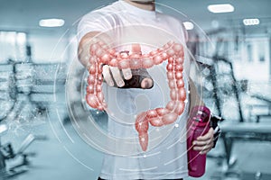Young fitness athlete clicks on the intestines