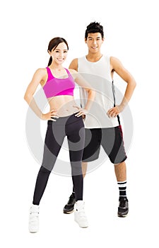 Young fitness couple standing together