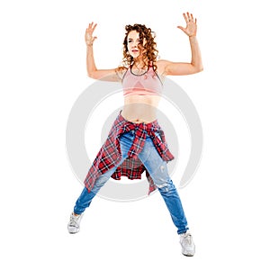 Young fitness girl dancing zumba isolated on white