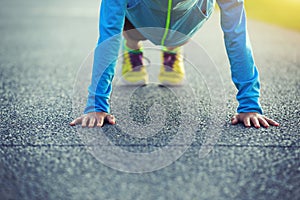 Young fitness woman exercising push up