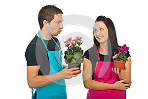 Young florists colleagues having conversation photo