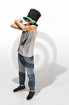 The young football fan - man hugging soccer ball isolated on a white background