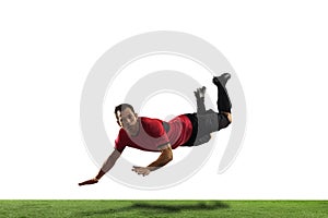 Young football, soccer player of team in action, motion isolated on white background. Concept of sport, movement, energy