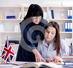 Young foreign student during english language lesson