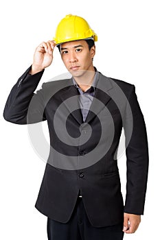 Young foreman or engineer with yellow hard hat in suit isolated